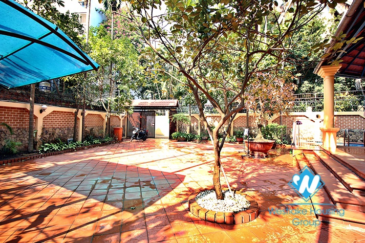 Big yard, swiming pool and five bedrooms house for rent in Tay Ho district, Ha Noi.